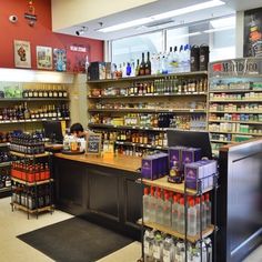 a store filled with lots of different types of bottles and condiments on shelves