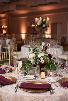 the table is set with place settings for dinner