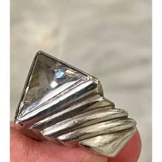 Show stopping Modernist crystal ring that radiates color. Beveled, wide sterling silver shank. Size 6 and may be slightly resized. Unsigned but marked "Sterling". Well cast and substantial at 49.7 grams. Modern Crystal Ring With Polished Finish For Formal Occasions, Modern Crystal Ring With Polished Finish For Formal Events, Modern Crystal Ring With Large Stone, Modern Silver Crystal Ring With Polished Finish, Silver Faceted Crystal Ring For Formal Occasions, Formal Silver Faceted Crystal Ring, Modern Silver Crystal Ring For Anniversary, Formal Silver Crystal Ring With Polished Finish, Unique Silver Crystal Ring For Formal Occasion