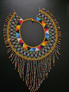 CLEARANCE SALE! Wholesale Zulu necklaces set of 2 , African jewelry for wedding ,multicolor necklace , Shoulder necklace. This listing is for ALL 5 necklaces exactly like shown above. All for $59 Size: Check more photos for sizes. **Buy multiple items and pay shipping for 1 item only.The rest ships free. More neckleces here; https://www.etsy.com/shop/TribalTess?ref=seller-platform-mcnav§ion_id=21306083 Back to my shop; https://www.etsy.com/shop/TribalTess?ref=seller-platform-mcnav Multicolor Choker Necklace For Celebration, Bohemian Multicolor Bridal Necklace With Round Beads, Multicolor Celebration Choker Necklace, Multicolor Choker Jewelry For Celebration, Multicolor Round Beads Bridal Necklace As Gift, Multicolor Bridal Necklace With Round Beads As Gift, Multicolor Bridal Necklace With Round Beads, Multicolor Bib Necklace Choker As Gift, Multicolor Bib Necklace Choker For Gifts