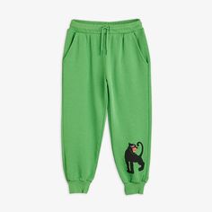 Green sweatpants featuring a Panther print on the left leg, made from 100 % GOTS certified organic cotton. The sweatpants are designed with ribbing at the waist and cuffs, two pockets as well as an elastic drawstring waist. Unisex Cotton Bottoms For Loungewear, Green Cotton Sweatpants With Ribbed Waistband, Organic Cotton Sweatpants With Elastic Waistband, Casual Green Organic Cotton Bottoms, Green Cotton Sweats With Elastic Waistband, Green Cotton Sweats With Pockets, Unisex Cotton Casual Pants, Cotton Sweatpants With Elastic Cuffs For Jogging, Green Jogging Bottoms With Ribbed Cuffs