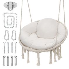 a white swing chair with chains and hooks on the back side, including two handles