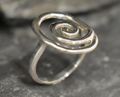 Silver Infinity Ring made of Solid 925 Sterling Silver ☞ made to last.Click here for ☞ Matching Earrings﻿Details:• Large Silver Swirl Ring • Dimensions: Band Width 2.1mm Thickness 1mm• Solid 925 Sterling SilverSKU 1643 Spiral Sterling Silver Jewelry For Anniversary, Modern Twist Swirl Ring For Gift, Modern Twist Swirl Ring As Gift, Modern Twist Swirl Ring For Gifts, Modern Twist Spiral Jewelry For Anniversary, Spiral Nickel-free Jewelry For Anniversary, Spiral Sterling Silver Jewelry For Wedding, Spiral Sterling Silver Wedding Jewelry, Gift Spiral Ring With A Modern Twist