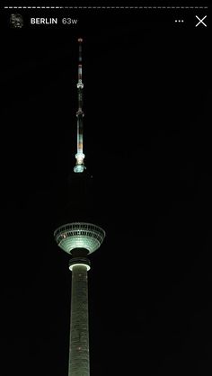 the berlin tv tower lit up at night