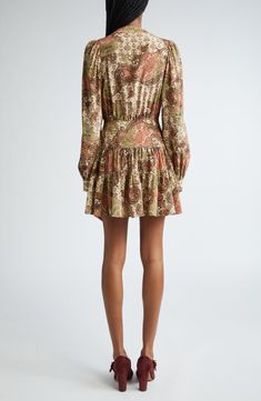 Move easily from work to weekend in this puff-shoulder, tiered silk mini crafted with a polished neckline tie and a swirling paisley print. V-neck with ties Long sleeves Side-seam pockets 100% silk Dry clean Imported Elegant Paisley Print Mini Dress, Brown Silk Dress, Long Sleeve Silk Dress, Ruffle Long Sleeve, Silk Print Dress, Brown Silk, Silk Midi Dress, Cotton Midi Dress, Blue Midi Dress