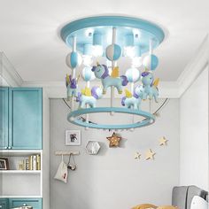 a child's bedroom with blue and white decor