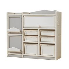 a white cabinet with several bins and shelves