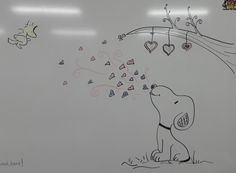 a drawing of a dog blowing hearts on a tree