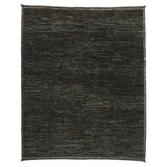 an area rug with dark green and black stripes on the bottom, in front of a white background