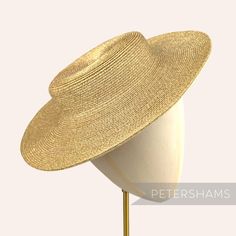 Boaters are all the rage, and this metallic gold polybraid fascinator version has us all in a twirl!  Made from spiraled polybraid, these boaters are ready to trim and have a petersham ribbon on it's inside edge. Simply add a comb or headband to secure to the head. Hat base measures: Width: 32cm (12.5 inches) Crown Width: Please note that the crown is on the larger side, measures 16.5cm (6.5 inches) wide.  Crown Height: 4.5cm (1.7 inches) For even more millinery supplies you can find us here: ww Gold Brimmed Straw Hat, Gold Brimmed Straw Hat For Kentucky Derby, Gold Wide-brim Straw Hat For Kentucky Derby, Gold Wide Brim Straw Hat For Kentucky Derby, Gold Structured Crown Hat For Summer, Adjustable Gold Straw Hat For Kentucky Derby, Gold Curved Brim Hat For Kentucky Derby, Gold Wide Brim Costume Hat For Parties, Gold Wide Brim Top Hat For Party