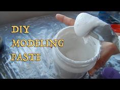 a person is painting something white with the words diy modeling paste in front of them