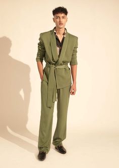 Editor's Note This jade men's pantsuit with a tie-up belt is a stylish and contemporary ensemble that is perfect for any occasion. The suit includes a blazer, belt and matching pants, creat... Green Pant Suit, Blazer Belt, Olive Green Pants, Honeymoon Outfits, Green Suit, Green Blazer, Graduation Outfit, Rich Fabric, Matching Pants