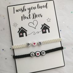 two bracelets that say i wish you loved next door