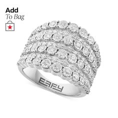 a white gold ring with round diamonds on the side and an effy logo above it