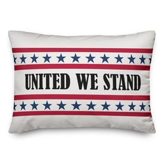 a pillow with the words united we stand on it in red, white and blue stars