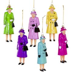 six plastic figurines of women in coats and hats, all wearing different colors