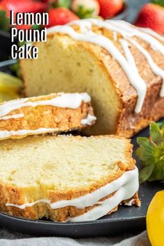 lemon pound cake with icing on a black plate