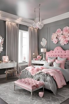 a pink and gray bedroom with flowers on the wall