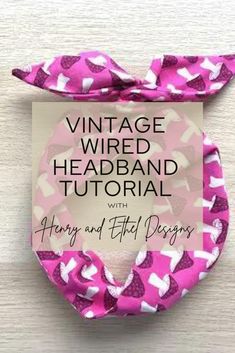 the vintage wired headband is made with pink fabric and white hearts on magenta