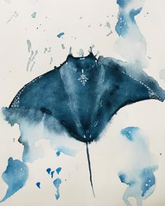 a watercolor painting of a blue and white flower