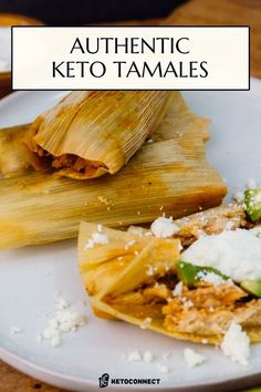 two tamales are sitting on a white plate