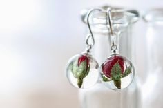 A beautiful pair of real flower earrings... these are for romantic nights and summer evenings; luxurious, velvet-petalled red roses. They are perfect, teeny tiny red rosebuds in 12mm globes. They are small, and strong, made of UV stable, extra strong crystal clear resin, with sterling silver ear wires, available in 2 lengths: extra-long hand-hammered earrings for a 40cm drop, or small 10mm drops. We spend time poring over our flowers to pair the roses up so your earrings will be as similar as na Flower Shaped Rose Earrings For Gift, Rose Flower Earrings For Gift, Rose Flower Earrings As Gift, Flower-shaped Rose Design Earrings For Gift, Flower Shaped Rose Design Earrings For Gifts, Flower Rose Design Earrings As Gift, Flower Shaped Earrings With Rose Design For Gift, Rose Design Flower Earrings As Gift, Rose Red Flower-shaped Earrings With Rose Design