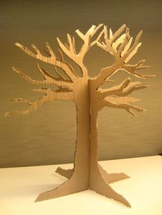 a paper sculpture of a tree with no leaves