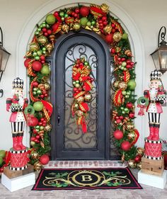 the front door is decorated with christmas decorations