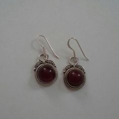 Handcrafted From Bali. Classic Red Nickel-free Earrings, Red Vintage Sterling Silver Earrings, Vintage Red Sterling Silver Earrings, Classic Red Sterling Silver Earrings, Classic Red Cabochon Earrings, Red Garnet Round Earrings, Red Cabochon Earrings For Gift, Red Cabochon Earrings Perfect For Gifts, Patina Earrings