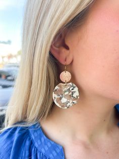 Elevate your wardrobe with our Zoey Earrings - Sandstone. These statement earrings feature a distinctive acrylic design, adding a playful touch to any outfit. Each pair boasts a unique color variation, while the 18K gold-plated hypoallergenic stainless steel hooks and gold-plated brushed brass charms exude sophistication. Made with durable plant-based acrylic, these earrings are lightweight and perfect for those who appreciate luxury and exclusivity. Acrylic Design, Acrylic Designs, Brass Charms, Brushed Brass, Unique Colors