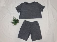 cute and comfy slightly cropped top and biker short combo Casual Crop Top With Built-in Shorts For Sports, Casual Short Crop Top For Sports, Gray Athleisure Crop Top For Summer, Casual Short Crop Top For Workout, Casual Gray Crop Top For Sports, Gray Stretch Crop Top For Loungewear, Casual Stretch Gray Biker Shorts, Casual Gray Biker Shorts For Workout, Grey Two Piece