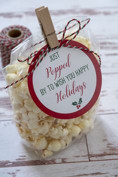 a bag filled with popcorn sitting on top of a table