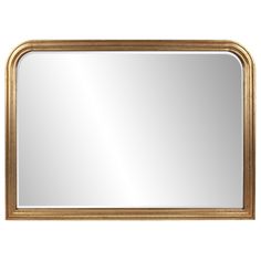 a gold framed mirror on a white wall