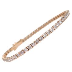 This exquisite bracelet is crafted from 14 kt rose gold and adorned with 4.25 carats of natural pink diamonds. Featuring 65 meticulously set diamonds, the bracelet radiates a delicate pink hue that exudes elegance and charm. Certified by GWLab for quality and authenticity, this piece is a perfect blend of luxury and sophistication, making it an enchanting addition to any jewelry collection. Side Stones: ___________ Natural Diamonds Cut: Round Brilliant Carat: 4.25 cttw / 65 stones Color: Pink Clarity: VS2-I1 Metal weight: 6.58 gr. Size: 18 cm Item ships from Israeli Diamonds Exchange, customers are responsible for any local customs or VAT fees that might apply to the purchase. **Import duties and taxes are not included in the item price. The Import process is very simple as the shipping co Pink Gold Bracelet, 14k Rose Gold Bracelet, Diamond Mines, Bracelet Tennis, Modern Bracelets, Timeless Jewelry, Pink Diamond, Tennis Bracelet, Arm Band