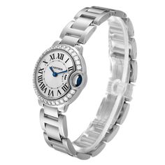 Cartier Ballon Bleu White Gold Diamond Bezel Ladies Watch WE9003Z3. Quartz movement. Caliber 057. Round 18K white gold case 28.0 mm in diameter. Case thickness: 9.35 mm. Fluted crown set with a blue sapphire cabochon. 18K white gold bezel set with original Cartier factory diamonds. Scratch resistant sapphire crystal. Silver sunburst dial with Roman numerals. Blued steel sword shape hands. 18k white gold bracelet with hidden butterfly clasp. Fits 6.5" wrist. Cartier Diamond Watch With Round Dial, Cartier Diamond Watch With Diamond Accents, Cartier Diamond Watch Chronometer For Anniversary, Anniversary Diamond Watch With Round Dial, Anniversary Diamond Watch With Diamond Hour Markers, Anniversary Diamond Watch With Hour Markers, Luxury Cartier Watch With Brilliant Cut, Classic Round Diamond Watch With Polished Finish, Diamond Watch With Subdials