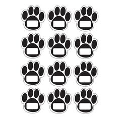 black and white dog paw print stickers on a white background, set of 12