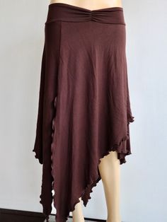 a mannequin wearing a brown skirt with ruffles on the bottom and sides