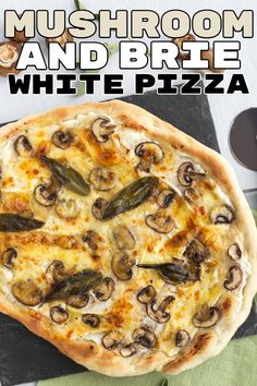 the mushroom and brie white pizza is ready to be eaten on the table for lunch