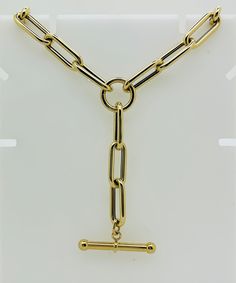 14kt Italian Yellow Gold Multi Link Paperclip Chain Necklace with toggle and round connector. The toggle part can be taken off for a different look. The necklace has x-large lobster lock ❤ 14kt yellow gold ❤ Large Link Size: 20 x 8 mm ❤ Lobster Lock Size : 15 x 10mm ❤ Connector size: 15mm ❤ Length : 18" + 2.5" toggle ❤Closure: large lobster lock 15x11mm ❤ Gold weight: 16gr ❤ Made in Italy Classic Link Toggle Necklace For Formal Occasions, Classic Yellow Gold Link Toggle Necklace, Classic Formal Toggle Link Necklace, Classic Gold-tone Link Toggle Necklace, Classic Toggle Necklace With Oval Link, Classic Toggle Necklace With Rectangular Links, Classic Formal Toggle Necklace With Toggle Clasp, Classic Toggle Clasp Necklace For Formal Occasions, Modern Link Toggle Necklace For Formal Occasions