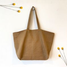 "This modern Linen Tote Bag is made with white cotton lining for stability and endurance. For everyday use to market, beach or extra bag for change of clothes or toys for kids. It's also a great bag to carry the souvenirs during your vacation trip. Just toss everything and head out for fun~ [Size] Approximate Size: 23\" x 15\", when laid flat [FABRIC DESCRIPTION]. * Exterior Material : Linen * Lining Material : 100% Cotton - Antique Tan [EASY CARE]  * Machine wash in cold water * Wash separately or with similar colors. * Air Dry Recommended *FREE SHIPPING on ALL ORDERS* Linen - Cotton Canvas Tote Bag | Eco Bag | Cotton Tote Bag | Market Tote | Grocery Bag | Beach Bag | Bento Bag | Minimalist Bag | Modern Bag | Shoulder Bag | Reusable Bag | Most Popular Item | Trending | Christmas Gift Idea Study Bag, Trending Christmas, Bento Bag, Linen Tote Bag, Bento Bags, Bag Minimalist, Market Tote Bag, Modern Bag, Minimalist Bag