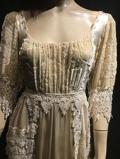 "Beautiful Edwardian Replica, Only one made, brand new from a posh local boutique in the 90's made by \"Belinda\" which later carved her name in bridal alternative gowns. (No tag, but guaranteed) Made with Pure Charmeuse silk which feels like butter. Cut Velvet is also silk. Expensive Battenburg lace. Elastic waist. Tie back belt. No size tag. Boutique tag still attached. Needs steaming. Please follow measurements. Bust 38\". Waist stretches to 40\". Hips about 52\". Length from shoulder to hem Victorian Wedding Dress With Empire Waist And Historical Design, Victorian Wedding Dress With Empire Waist, Cream Vintage Dress For Wedding, Elegant Cream Victorian Dress For Wedding, Cream Floor-length Vintage Dress For Wedding, Cream Vintage Floor-length Wedding Dress, Cream Floor-length Vintage Wedding Dress, Elegant Vintage Wedding Dress With Historical Design, Elegant Lace Victorian Wedding Dress