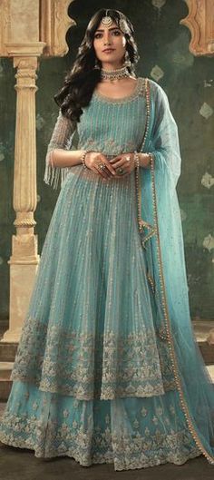 Blue color Long Lehenga Choli in Net fabric with Embroidered, Stone, Thread, Zari work Blue Semi-stitched Gown With Intricate Embroidery, Blue Gown With Intricate Embroidery Semi-stitched, Blue Anarkali Sharara For Reception, Blue Embroidered Bollywood Gown, Blue Floor-length Salwar Kameez With Intricate Embroidery, Blue Bollywood Gown With Intricate Embroidery, Blue Saree Gown With Intricate Embroidery, Blue Gown With Intricate Embroidery For Eid, Eid Blue Gown With Zari Work