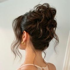 From super soft and romantic to ultra sleek and modern, there's one for you. Low Curled Bun Wedding Hair, Curled French Twist, Loose Bun Hairstyles Wedding, Loose Curled Updo, Loose Curl Updo Messy, Bridesmaid Hairstyles Updo High, Hair For Mock Neck Dress, French Twist Brunette, Bride Hair High Bun