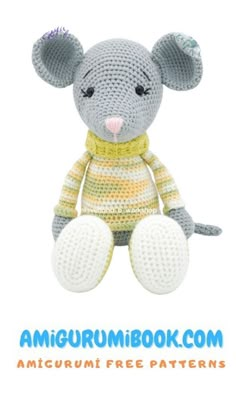 a crocheted stuffed mouse is shown with the words amigurum book com