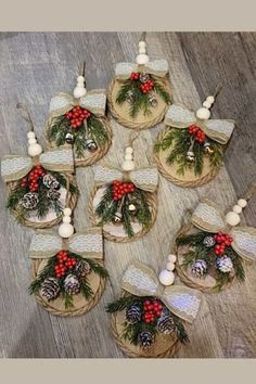 christmas decorations made out of burlocks and pine cones on top of wooden boards