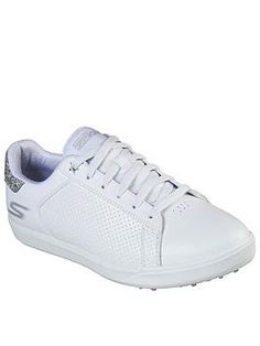 a women's white tennis shoe with silver detailing