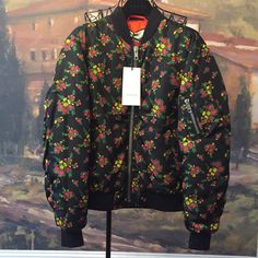 Bnwt Authentic Gucci Floral Bouquets Print Bomber Jacket This Black And Multicolor Gucci Floral Bomber Jacket From The 2018 Collection Is Insulated, Features Bouquet On Velvet, Ribbed Baseball Collar And A Wool Knit Trim. It Also Has An Interior Orange Contrast Lining, Zips On The Arm, And An All-Over Botanical Print. Size 36 (Us 6) Includes Gucci Hanger, Garment Bag And Gucci Large Paper Bag. Smoke Free Environment Gucci Black Spring Outerwear, Designer Fall Floral Print Outerwear, Designer Floral Print Fall Outerwear, Designer Floral Print Outerwear For Work, Designer Floral Print Workwear Outerwear, Gucci Multicolor Fall Outerwear, Gucci Multicolor Outerwear For Fall, Gucci Long Sleeve Spring Outerwear, Gucci Spring Long Sleeve Outerwear