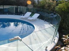 Curved glass pool fence curved glass railing Curved Balcony, Pool Rails, Pool Gate, Staircase Railing Design, Railings Outdoor