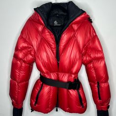 Moncler Grenoble Montijoux Puffer Jacket Red Women’s Size 3/M $2,050. New Without Tags. Moncler Grenoble Montijoux Puffer Jacket Moncler Approaches Outerwear With A Sense Of Modernity. A Fine Example Of The Brand’s Aesthetic, This Montijoux Padded Jacket Aims To Ensure Comfort Thanks To A Feather-Down Interior. The Belted Waist And The Diamond-Quilted Finish Adds A Distinctive Flair To This Red-Tone Design. Imported Highlights Red Down-Feather Filling Diamond-Quilted Detailing Drawstring Hood Be Luxury Red Winter Outerwear, Highlights Red, Puffer Jacket With Fur, Moncler Grenoble, Blanket Jacket, Red Puffer, Red Tone, Moncler Women, Moncler Jacket