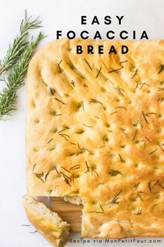 an easy focaccia bread with rosemary sprigs on top and text overlay